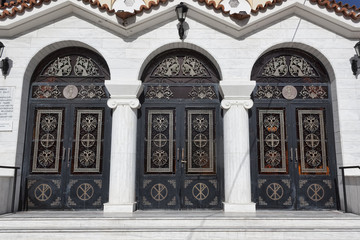 Large triple doors of the Orthodox church with decorative elements