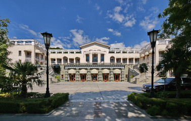 Magnificent view of the palace with beautiful architecture and white walls with stairs from both...