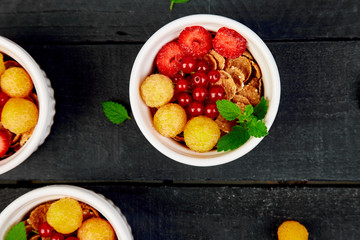 ..Healthy breakfast on white bowls.