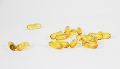 capsules source of selective focus in front object isolated on white background