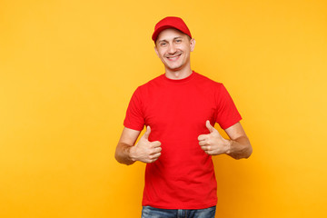 Delivery man in red uniform isolated on yellow orange background. Professional smiling male employee in cap, t-shirt working as courier or dealer showing thumbs up gesture. Service concept. Copy space