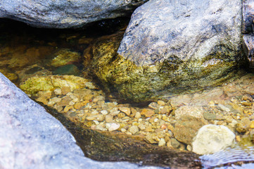 Beautify of watercourse around stones and gravels, Thailand. For travel, nature and forest.