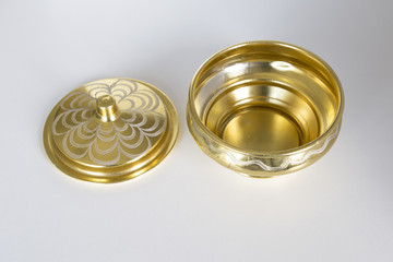 isolated old gold color copper kitchenware on the wooden background.