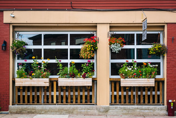 Storefront with flower boxes, in Mount Washington, Pittsburgh, Pennsylvania