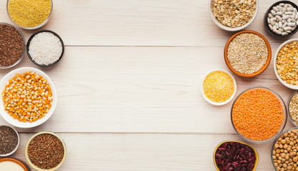 Cereals and legumes assortment on wooden table