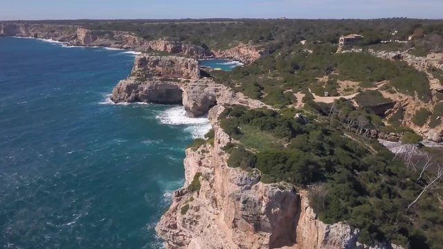 Mallorca cliff coastline, Spain. 4K Aerial footage.