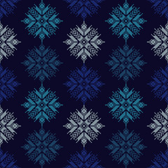 Fototapeta na wymiar Seamless vector background with Norwegian snowflakes. Pixel snowflakes. Winter pattern. Textile rapport.