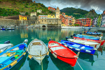 Fototapeta na wymiar Vernazza village with harbor and boats, Cinque Terre, Italy, Europe