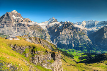 Fantastic summer landscape with high snowy mountains, Grindelwald, Switzerland, Europe
