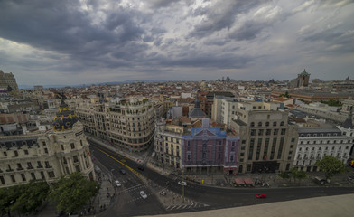 Obraz premium Madrid, Spain cityscape above Gran Via shopping street. Spain during sunset.
