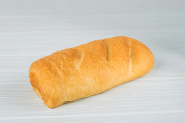 Homemade bread - ciabatta on a light background.