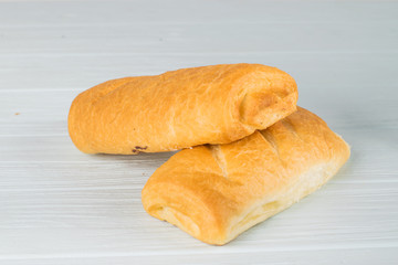 Homemade bread - ciabatta on a light background.