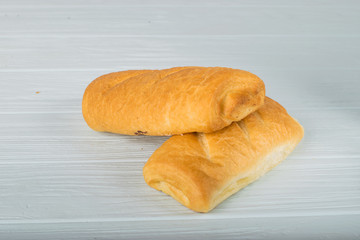 Homemade bread - ciabatta on a light background.