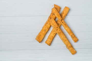 salted crispy cookies with sesame seeds on white background