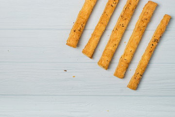 salted crispy cookies with sesame seeds on white background