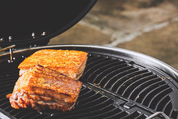 Crispy pork on grill