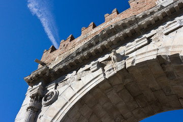  Rimini - The roman Arch of Augustus detail  against the blue sky. Emilia-Romagna
