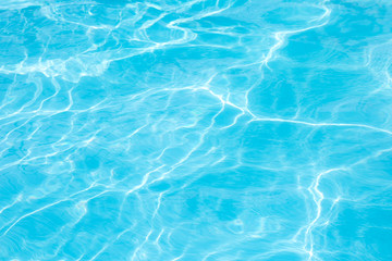Fototapeta na wymiar Surface of blue swimming pool, background of water in swimming pool. Summer Background. Summer
