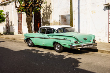Cienfuegos, Cuba - March 2018.  Vintage Americar car on the streets of Cienfuegos, Cuba
