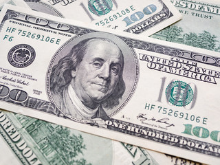 Closeup American dollars banknote. One hundred dollar banknote. earning money & saveing money Concept.