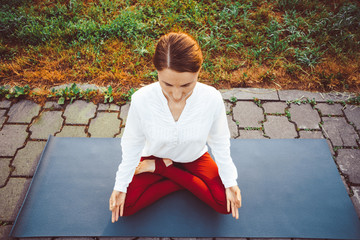 girl doing yoga outdoors
