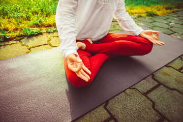 girl doing yoga outdoors