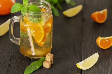 Refreshing summer cocktail with chopped ice and citrus fruits
