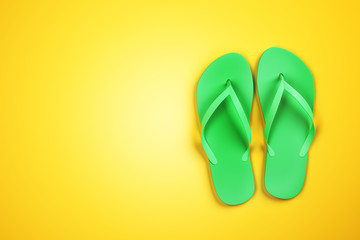 Green slippers on yellow background