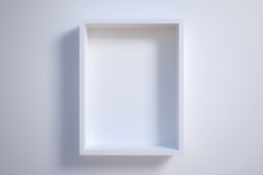 white picture frame on white wall