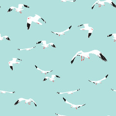 seamless pattern flying seagull on blue background, vector illustration