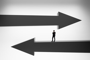 Businessman on black arrows