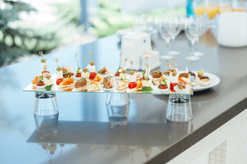 Snacks, fish and meat specialities on the buffet.