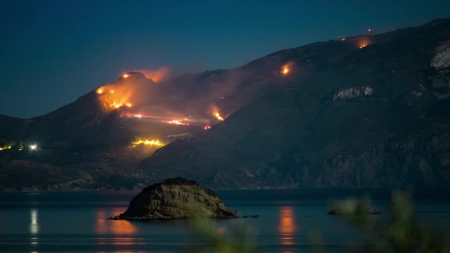 High-resolution 4K Time-Lapse of Raging Forest Fire at Night in Zakynthos, Greece