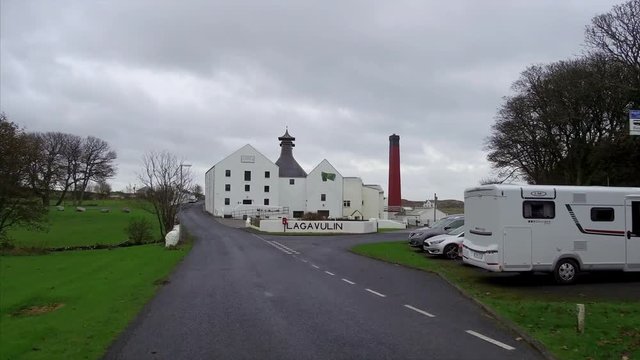 POV Driving Towards a Distillery in Islay Scotland