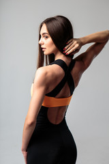 Fototapeta premium Young woman in a sport casuall costume, fitness model.