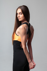 Fototapeta premium Young woman in a sport casuall costume, fitness model.