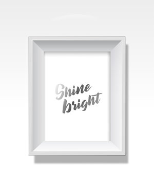 Vector golden background picture frame with Shine bright slogan.