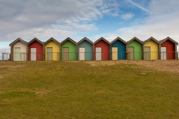 Fototapeta na wymiar Beach huts in a row