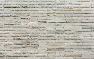Old grunge retro style bricks wall background and texture.