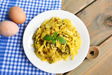 pickled cabbage fried eggs or Stir Fry Pickled Mustard Greens with Eggs  Asian menu style.