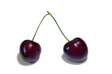 two cherry berries on a white background isolated