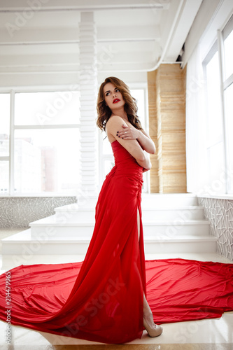 Beautiful Brunette Woman In A Red Dress Fashion Beauty Portrait