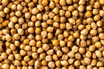 Top view chickpea groats as a natural food background. Concept of healthy vegetarian diet.