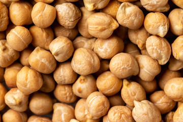 Top view macro chickpea groats as a natural food background. Concept of healthy vegetarian diet.