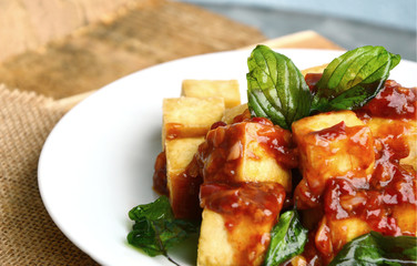 Fried Tofu with Spicy Basil Sauce or Stir Fried Tofu with Thai Basil.