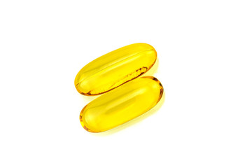 Fish oil supplement capsules isolated on white background