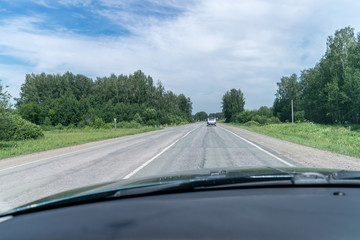 Country road with a view from the car