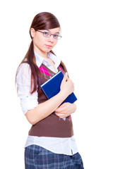 schoolgirl standing with book in hands