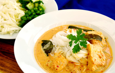Rice noodles with fish and coconut curry sauce.(Thai name is Kanom Jeen Nam Ya Pla).
Traditional Thai rice noodles menu.