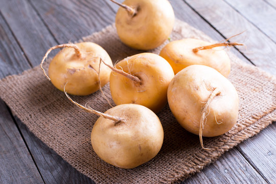 Yellow Turnip On A Wooden Table